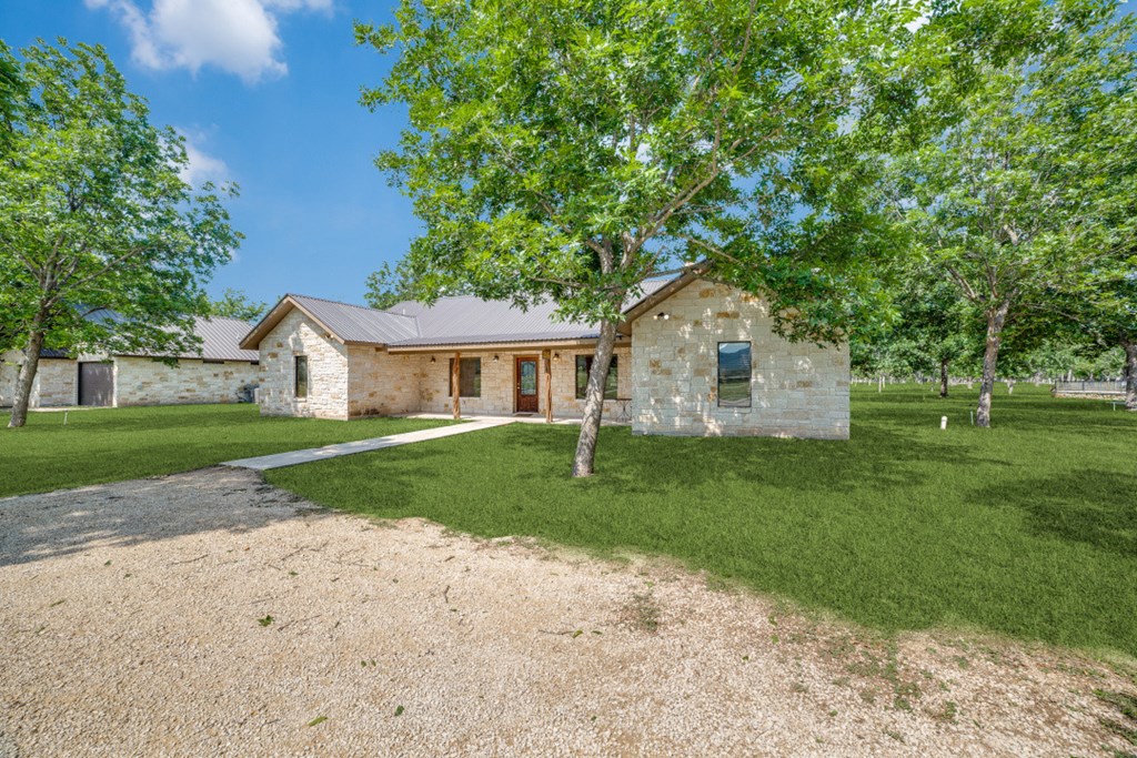 170 Johhny Seibert Lane Rio Frio, TX 78879 - Photo 3 of 67 a front view of a house with a yard