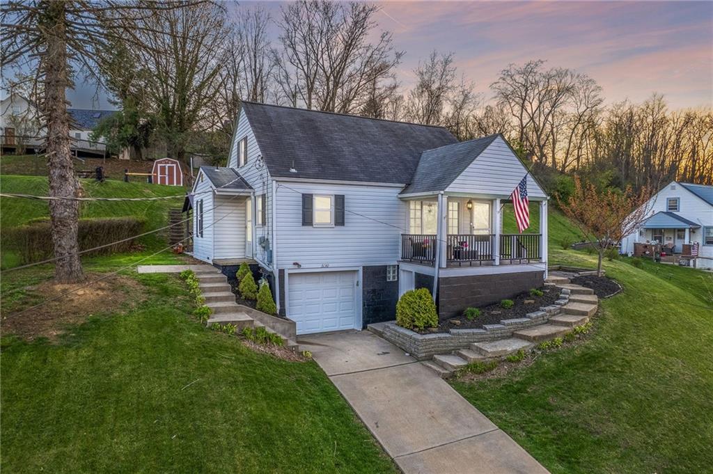 3130 Ridgeway Drive South Park, PA 15129 - Photo 1 of 49 a front view of a house with garden