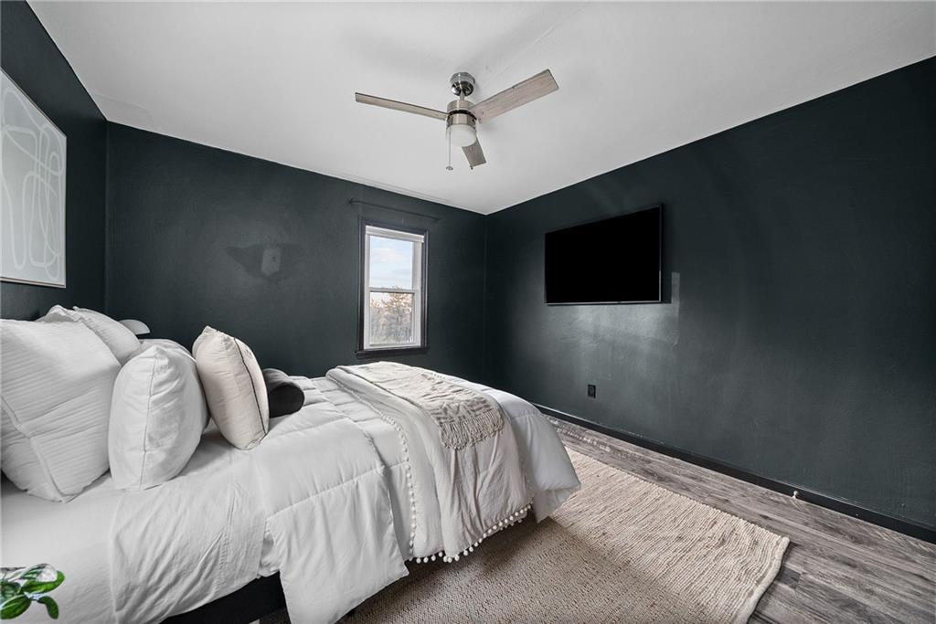 3130 Ridgeway Drive South Park, PA 15129 - Photo 22 of 49 a bedroom with two large bed and a flat screen tv