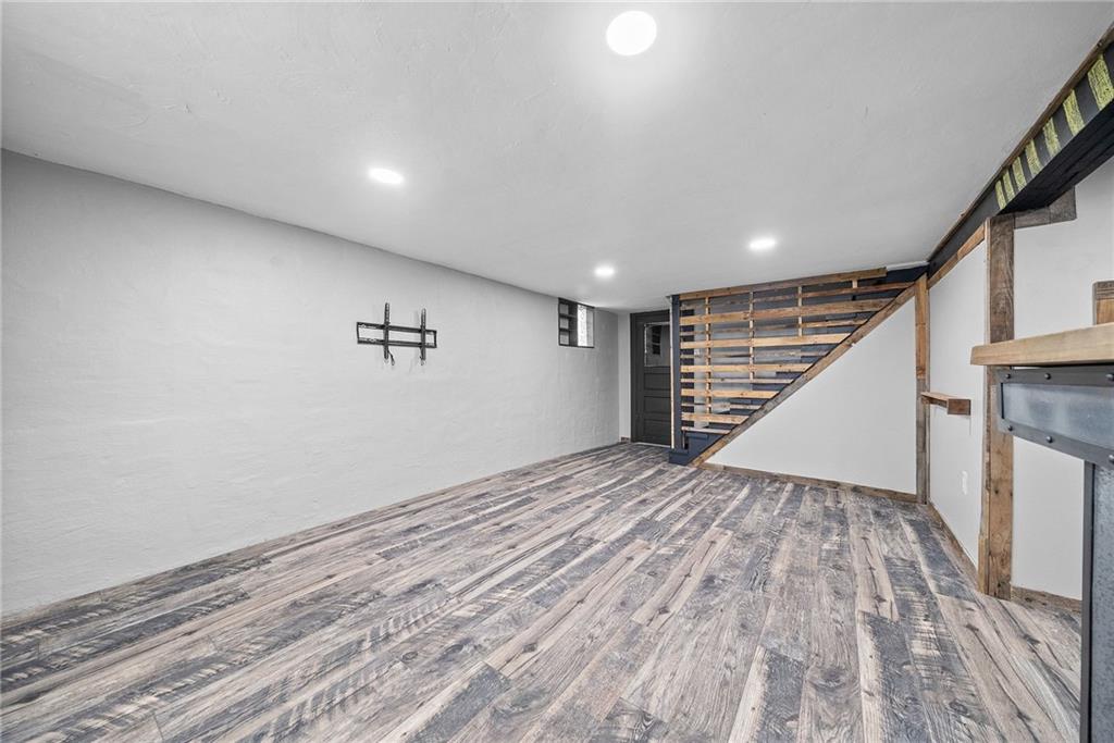 3130 Ridgeway Drive South Park, PA 15129 - Photo 31 of 49 a view of empty room with wooden floor and stairs