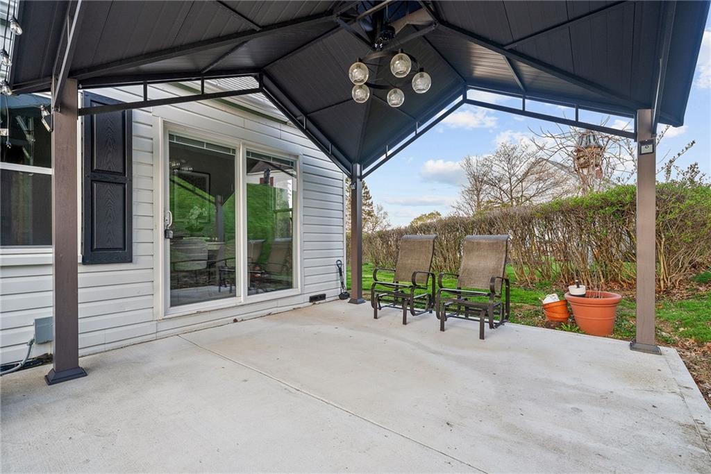 3130 Ridgeway Drive South Park, PA 15129 - Photo 37 of 49 a view of a porch with furniture and floor to ceiling window