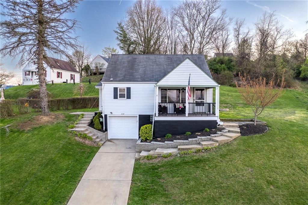 3130 Ridgeway Drive South Park, PA 15129 - Photo 42 of 49 a front view of a house with a yard table and chairs