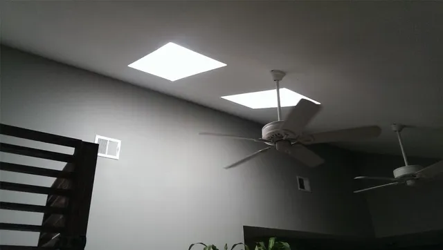 a view of a room with a fan