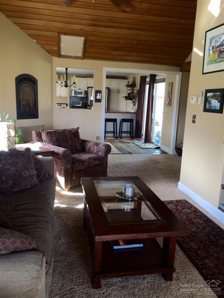 65520 Kentucky Road Bend, OR 97703 - Photo 14 of 25 a living room with furniture and a window
