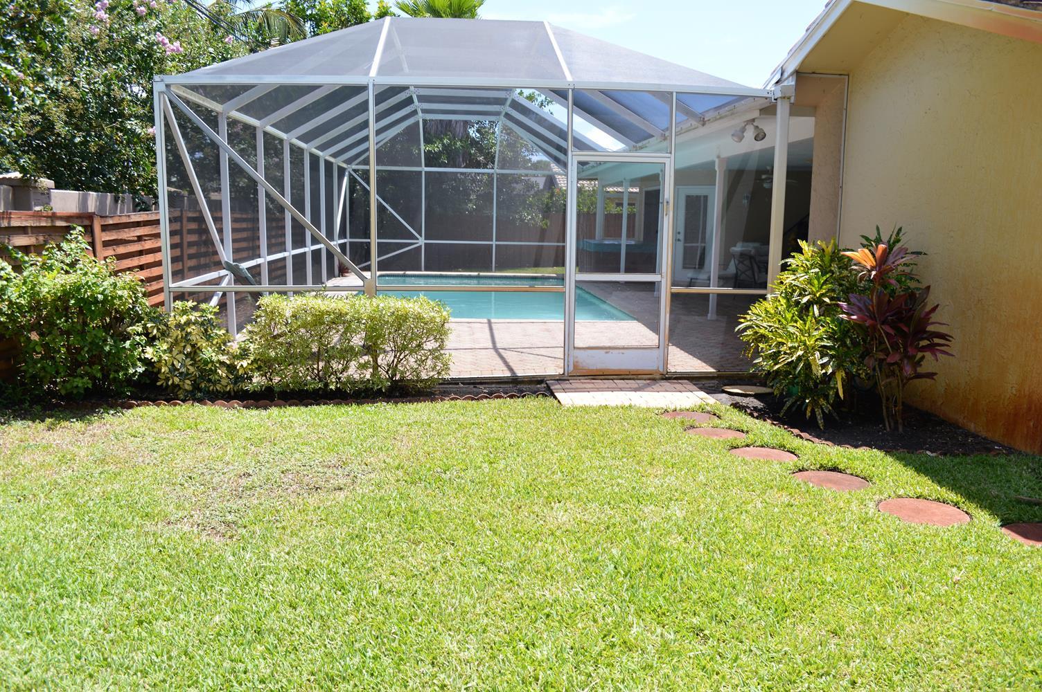 1839 Crafton Road North Palm Beach, FL 33408 - Photo 20 of 24 Backyard/Pool