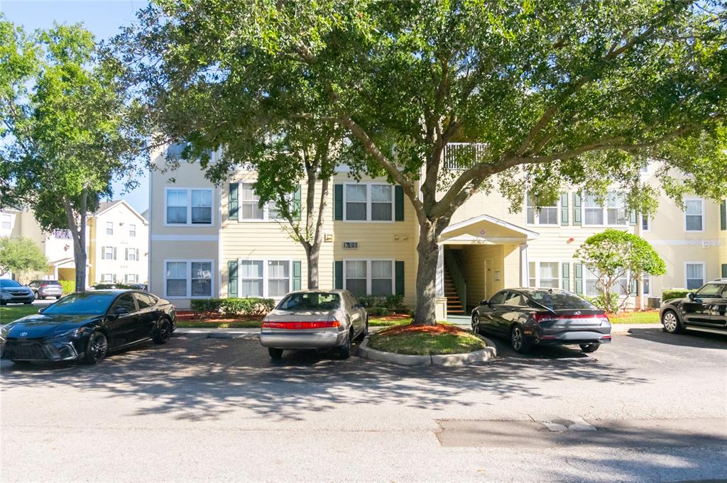 18103 Back Stretch Lane Tampa, FL 33647 - Photo 1 of 24 a building with cars parked in front of it