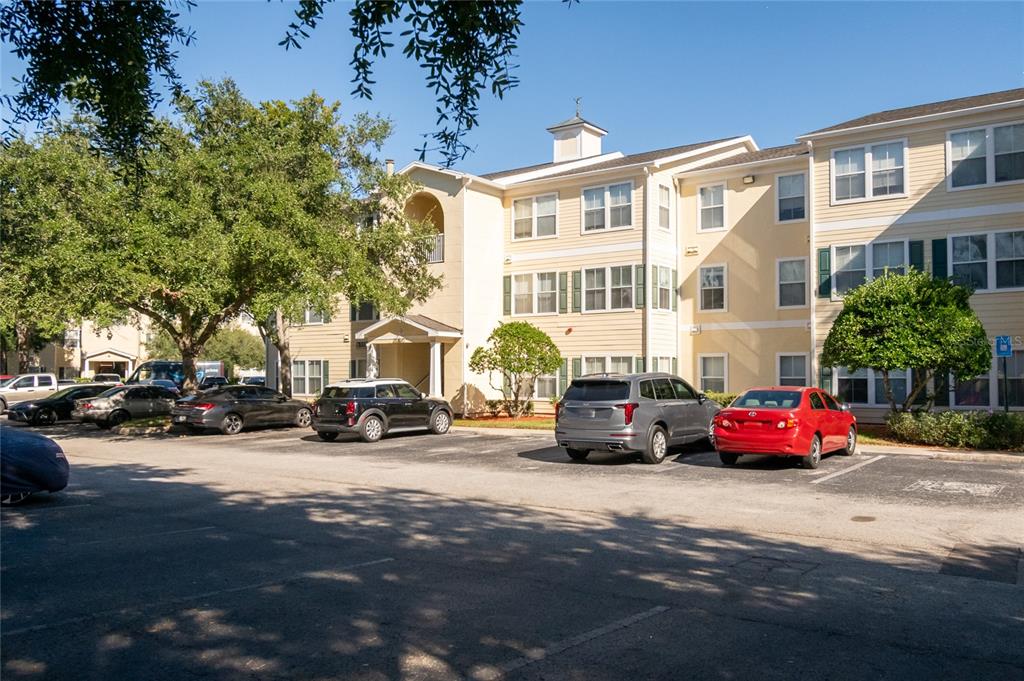 18103 Back Stretch Lane Tampa, FL 33647 - Photo 14 of 24 a car parked in front of a building