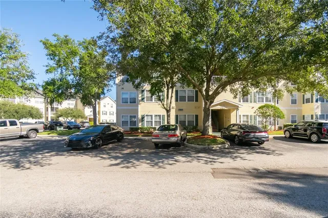 a view of a street with cars