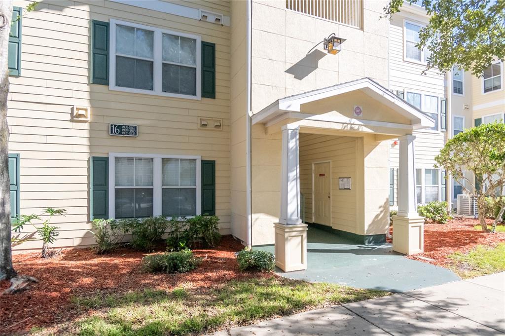 18103 Back Stretch Lane Tampa, FL 33647 - Photo 2 of 24 a front view of a house with a yard