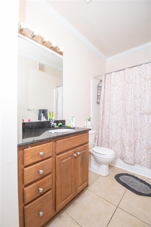 18103 Back Stretch Lane Tampa, FL 33647 - Photo 9 of 24 a bathroom with a toilet a sink and a mirror