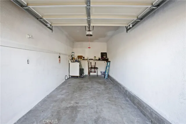 a view of a hallway with a window