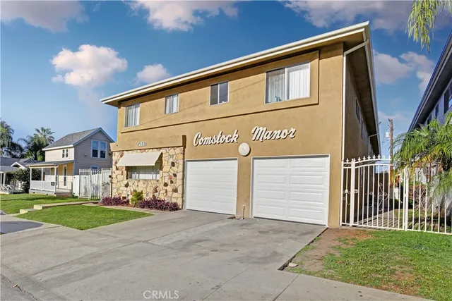 an aerial view of a city with lots of residential buildings