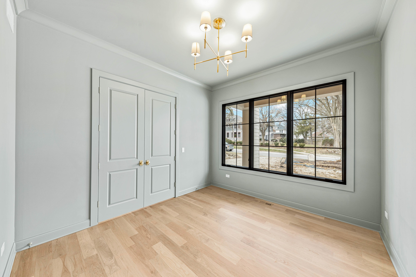 1310 Eagle Street Naperville, IL 60563 - Photo 12 of 38 a view of an empty room with a window