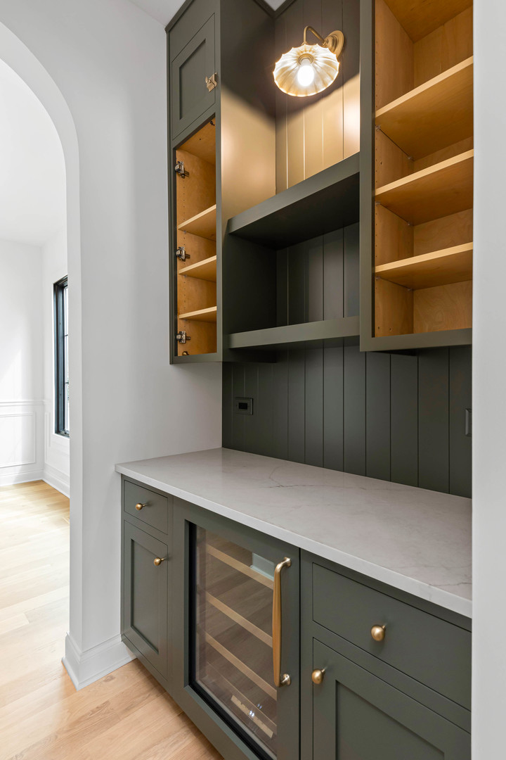 1310 Eagle Street Naperville, IL 60563 - Photo 14 of 38 a kitchen with cabinets and wooden floor