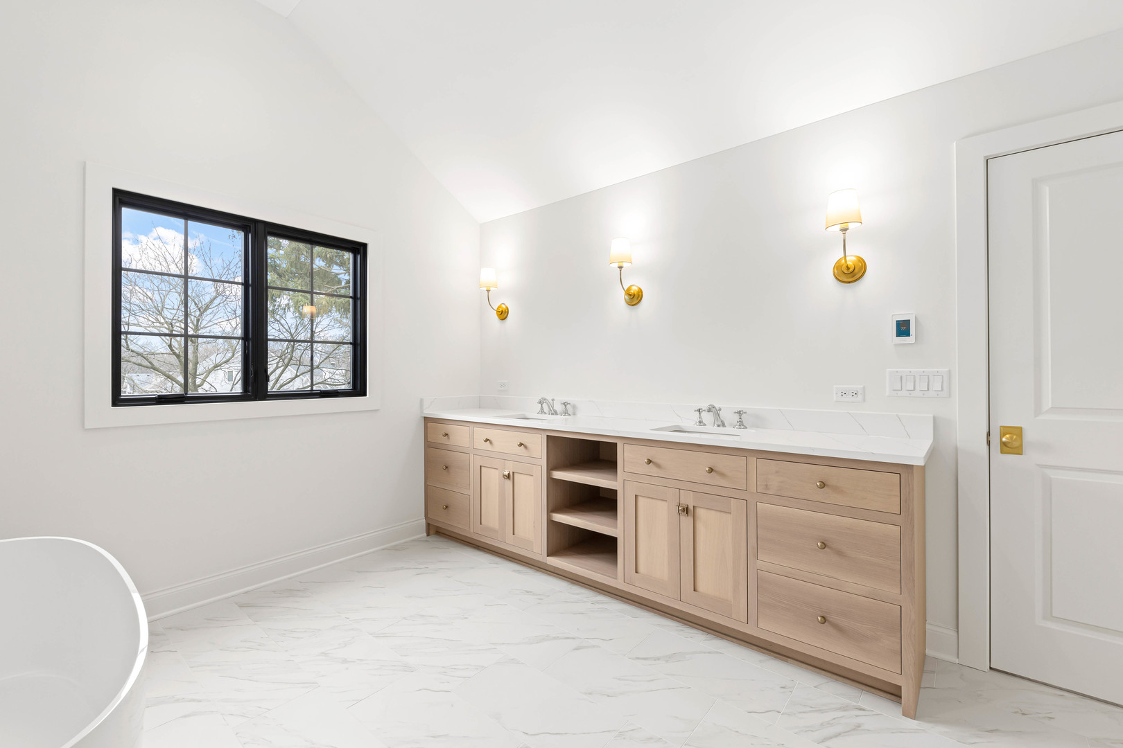 1310 Eagle Street Naperville, IL 60563 - Photo 23 of 38 a spacious bathroom with a granite countertop sink and a mirror