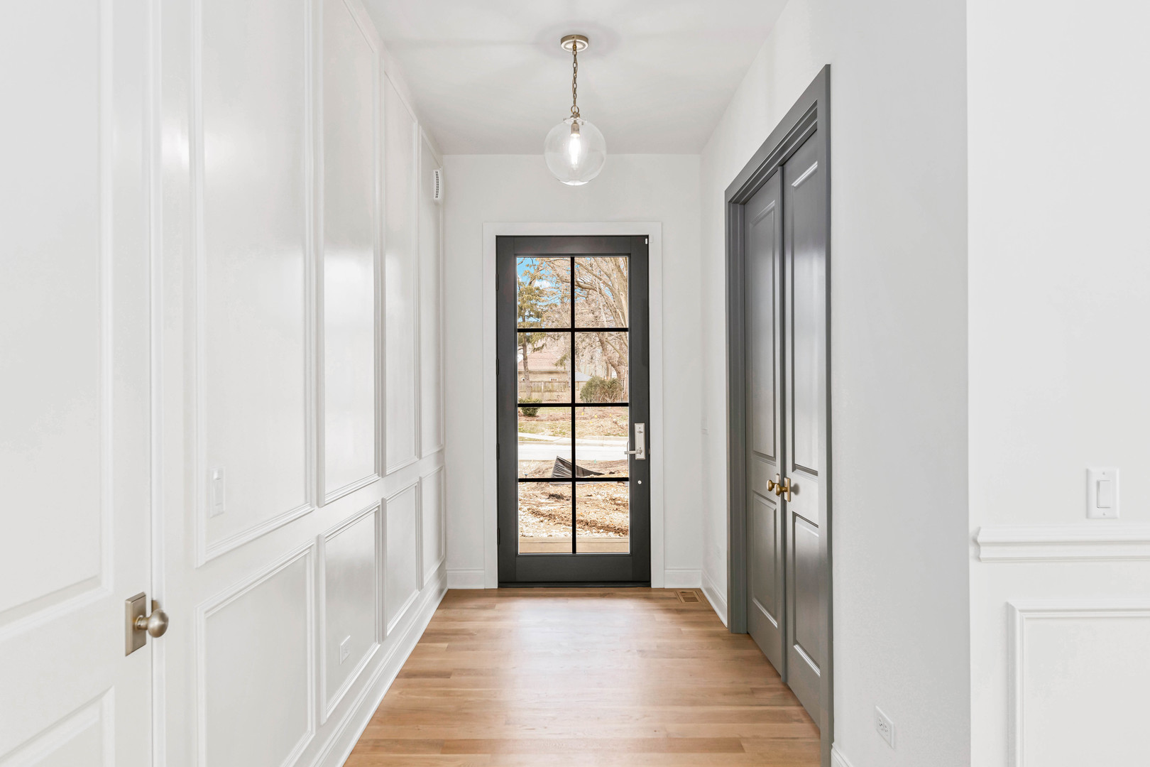 1310 Eagle Street Naperville, IL 60563 - Photo 10 of 38 a view of a room with wooden floor and windows