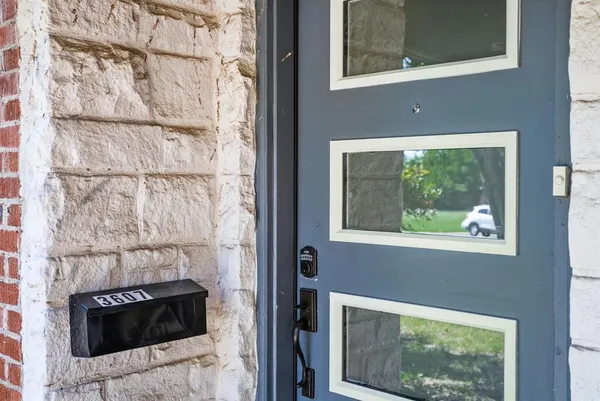 a room with a fireplace and a window