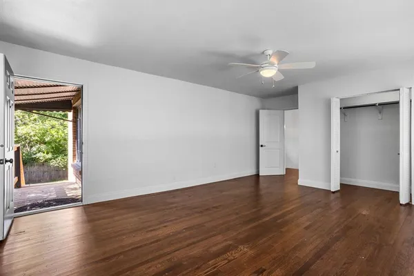 a view of a door and a window