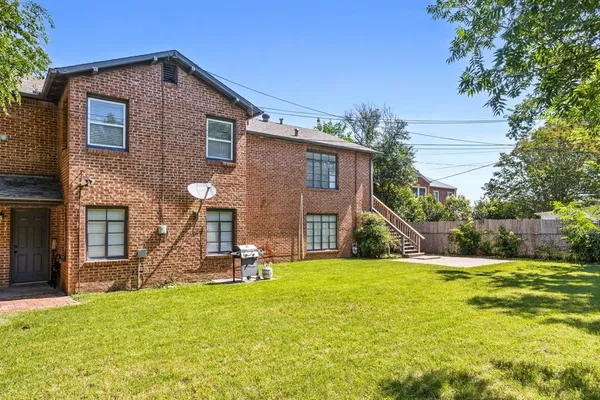 an aerial view of a city with lots of residential buildings