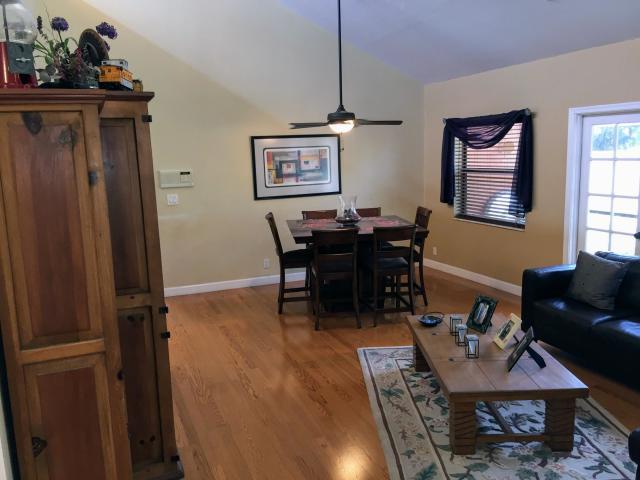 22701 Bella Rita Circle Boca Raton, FL 33433 - Photo 14 of 24 a living room with furniture and wooden floor
