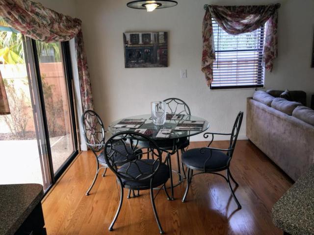 22701 Bella Rita Circle Boca Raton, FL 33433 - Photo 18 of 24 a view of a dining room with furniture window and outside view