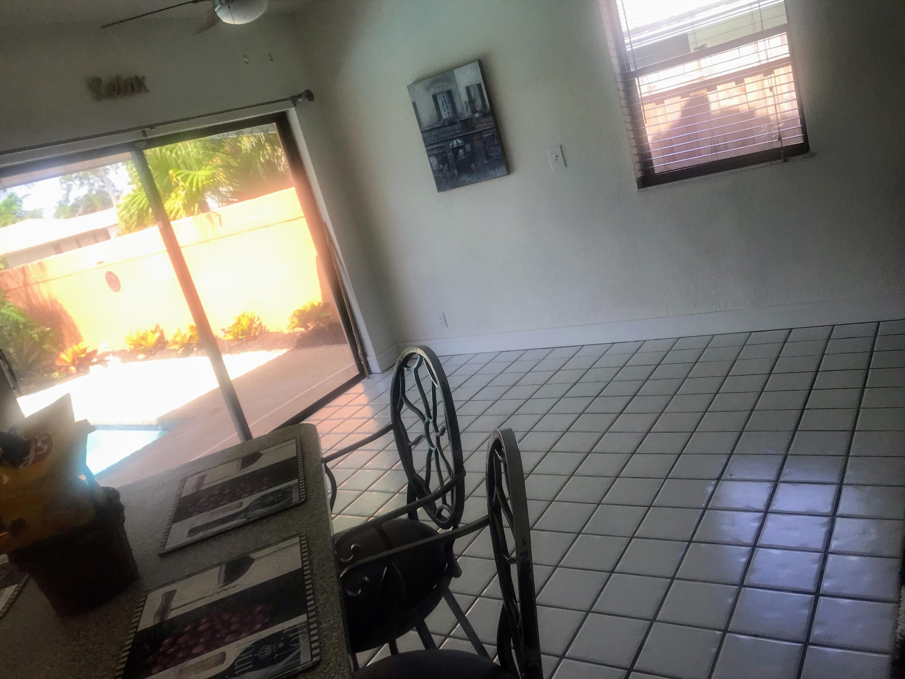 22701 Bella Rita Circle Boca Raton, FL 33433 - Photo 19 of 24 a view of a room with window and furniture