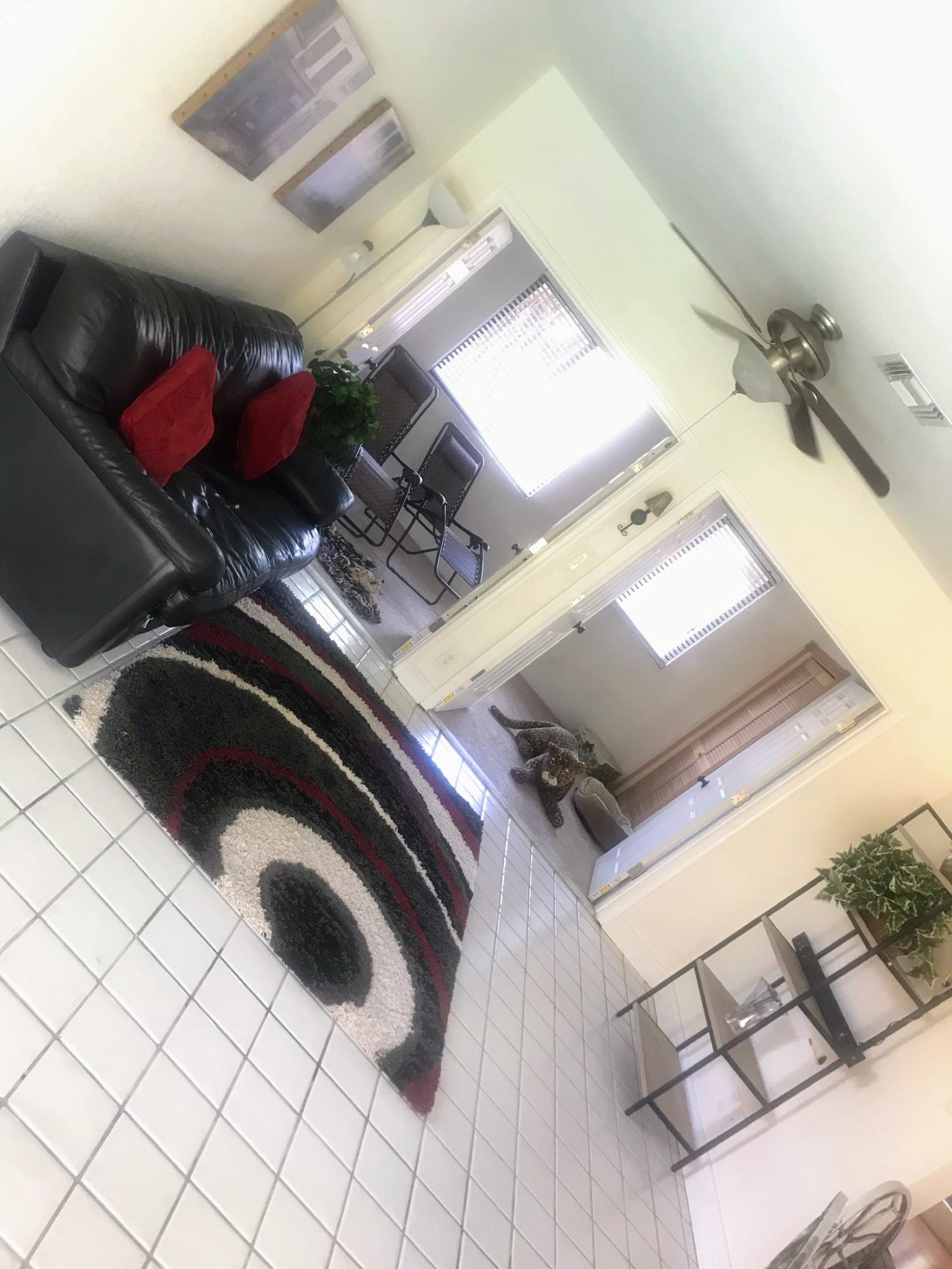 22701 Bella Rita Circle Boca Raton, FL 33433 - Photo 20 of 24 a view of an empty room and wooden floor