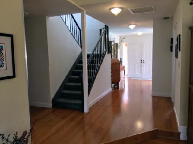 22701 Bella Rita Circle Boca Raton, FL 33433 - Photo 4 of 24 a view of entryway with wooden floor and stairs