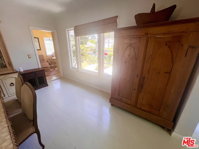 a view of livingroom with furniture and a window