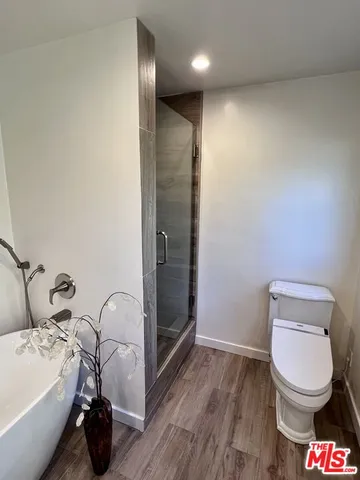 a bathroom with a toilet and a sink
