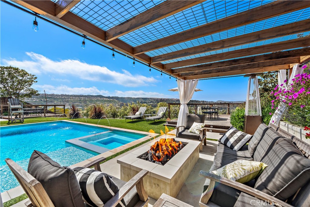 30331 Benecia Avenue Laguna Niguel, CA 92677 - Photo 14 of 28 Sitting area in backyard. 1 of 3 fire pits