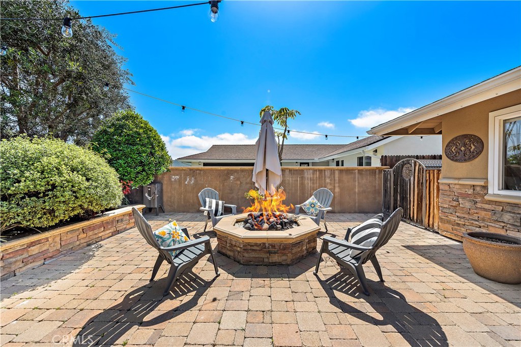 30331 Benecia Avenue Laguna Niguel, CA 92677 - Photo 24 of 28 Front courtyard with fire pit and fountain