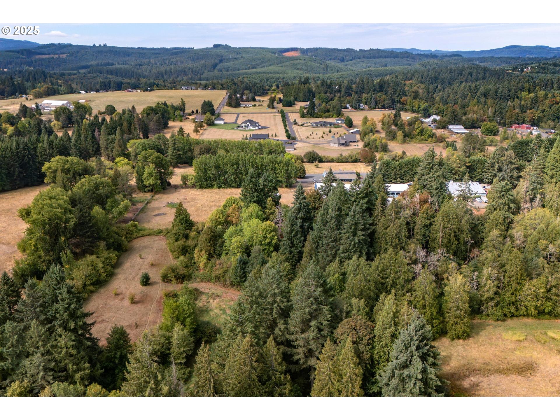 Bennet Road Warren, OR 97053 - Photo 10 of 22 a view of a city with mountains in the background