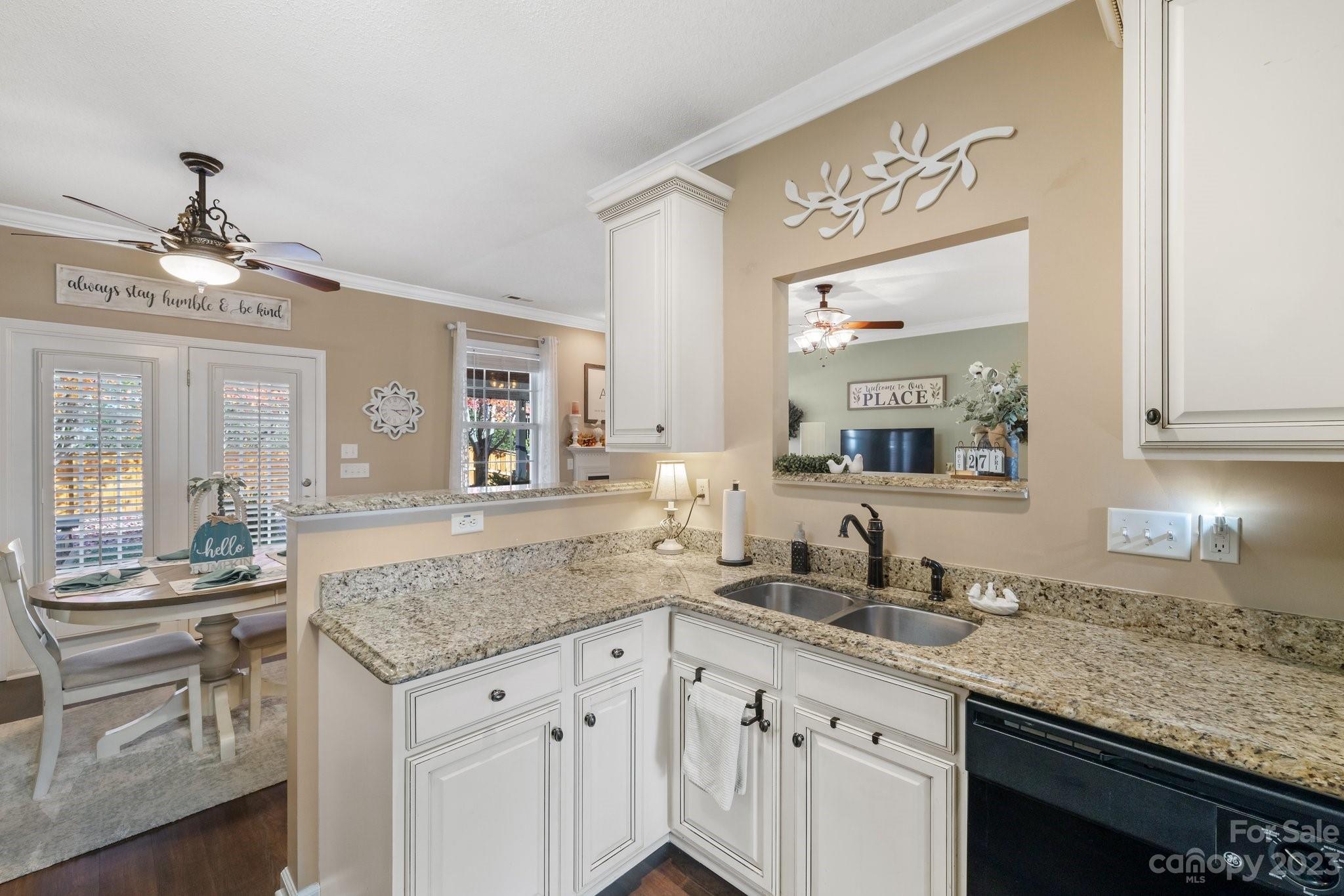 101 Woodfern Road Fletcher, NC 28732 - Photo 13 of 38 a bathroom with a granite countertop sink and a mirror