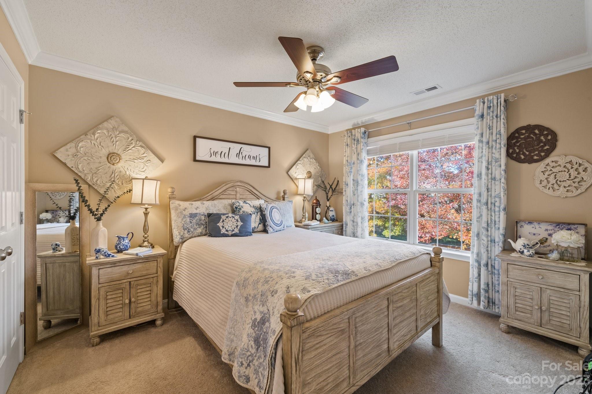 101 Woodfern Road Fletcher, NC 28732 - Photo 22 of 38 a bedroom with a bed and a window