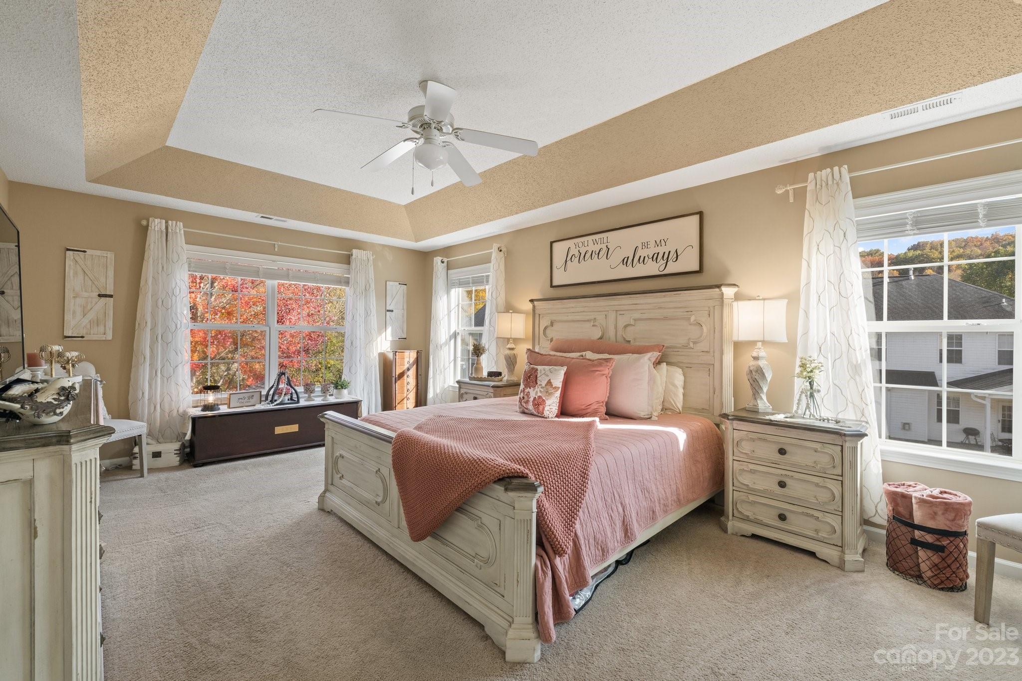 101 Woodfern Road Fletcher, NC 28732 - Photo 26 of 38 a bedroom with a bed and a large window