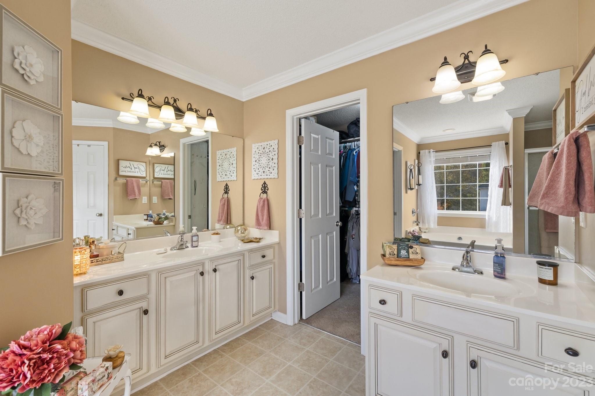 101 Woodfern Road Fletcher, NC 28732 - Photo 29 of 38 a bathroom with a double vanity sink mirror and double