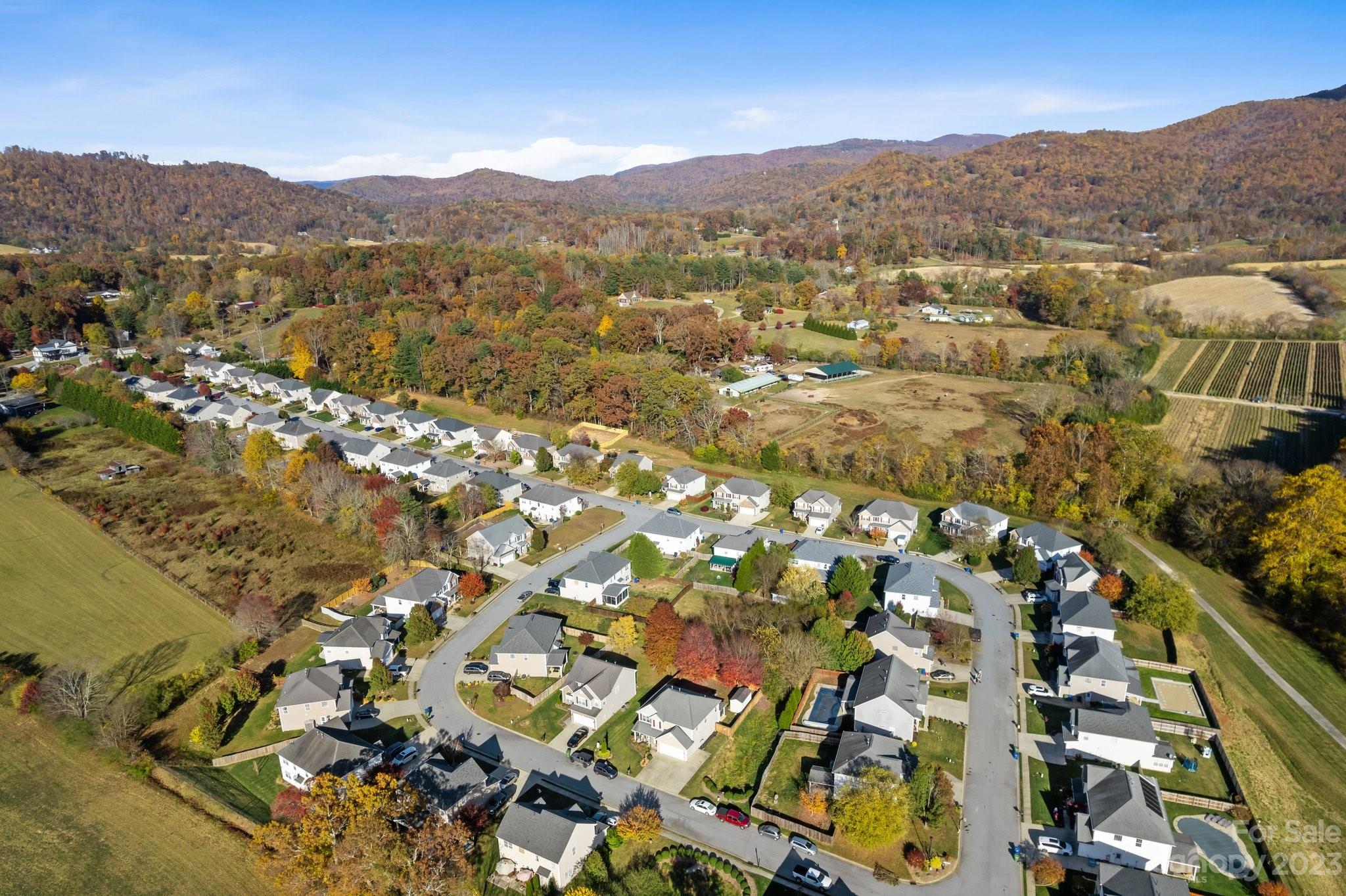101 Woodfern Road Fletcher, NC 28732 - Photo 35 of 38 an aerial view of residential houses with outdoor space and river