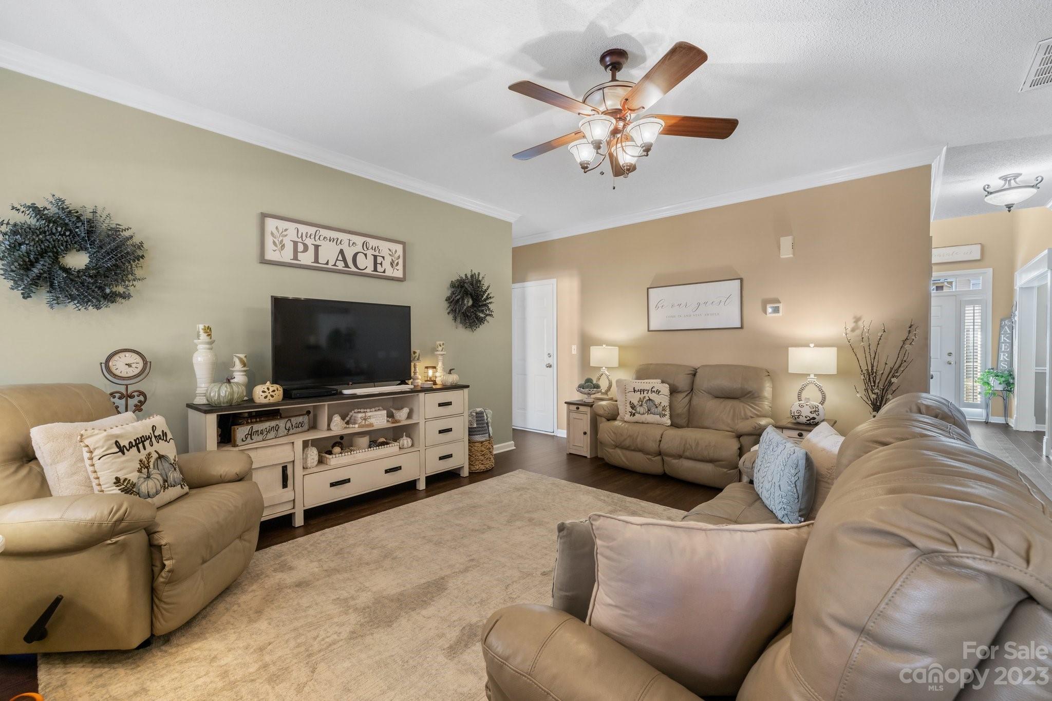 101 Woodfern Road Fletcher, NC 28732 - Photo 4 of 38 a living room with furniture and a flat screen tv
