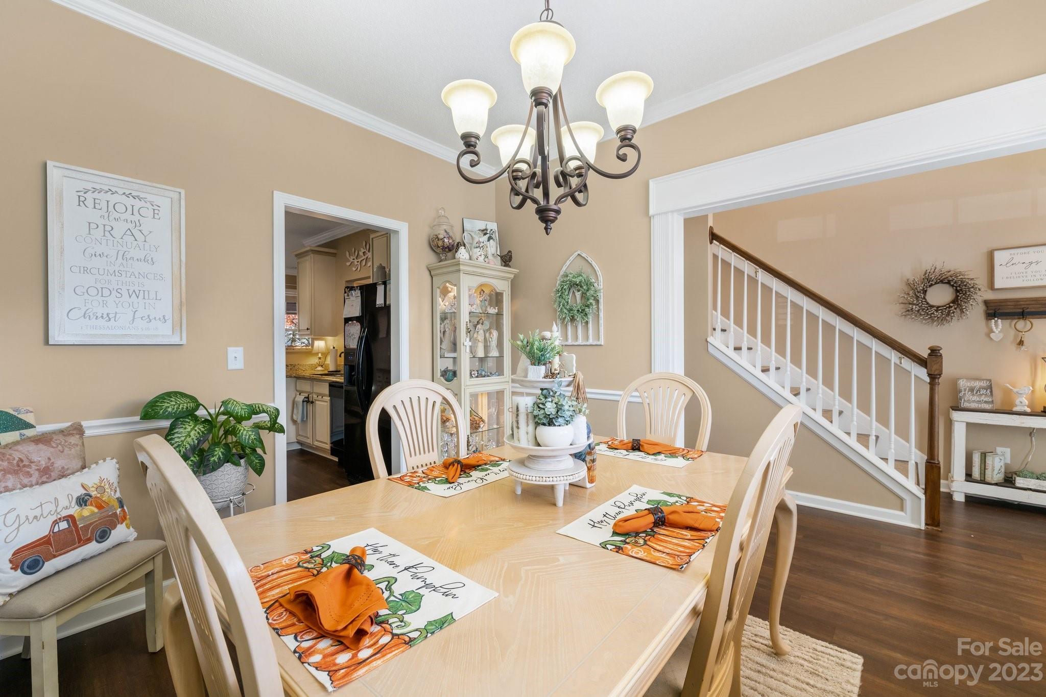 101 Woodfern Road Fletcher, NC 28732 - Photo 7 of 38 a view of a dining room with furniture and wooden floor