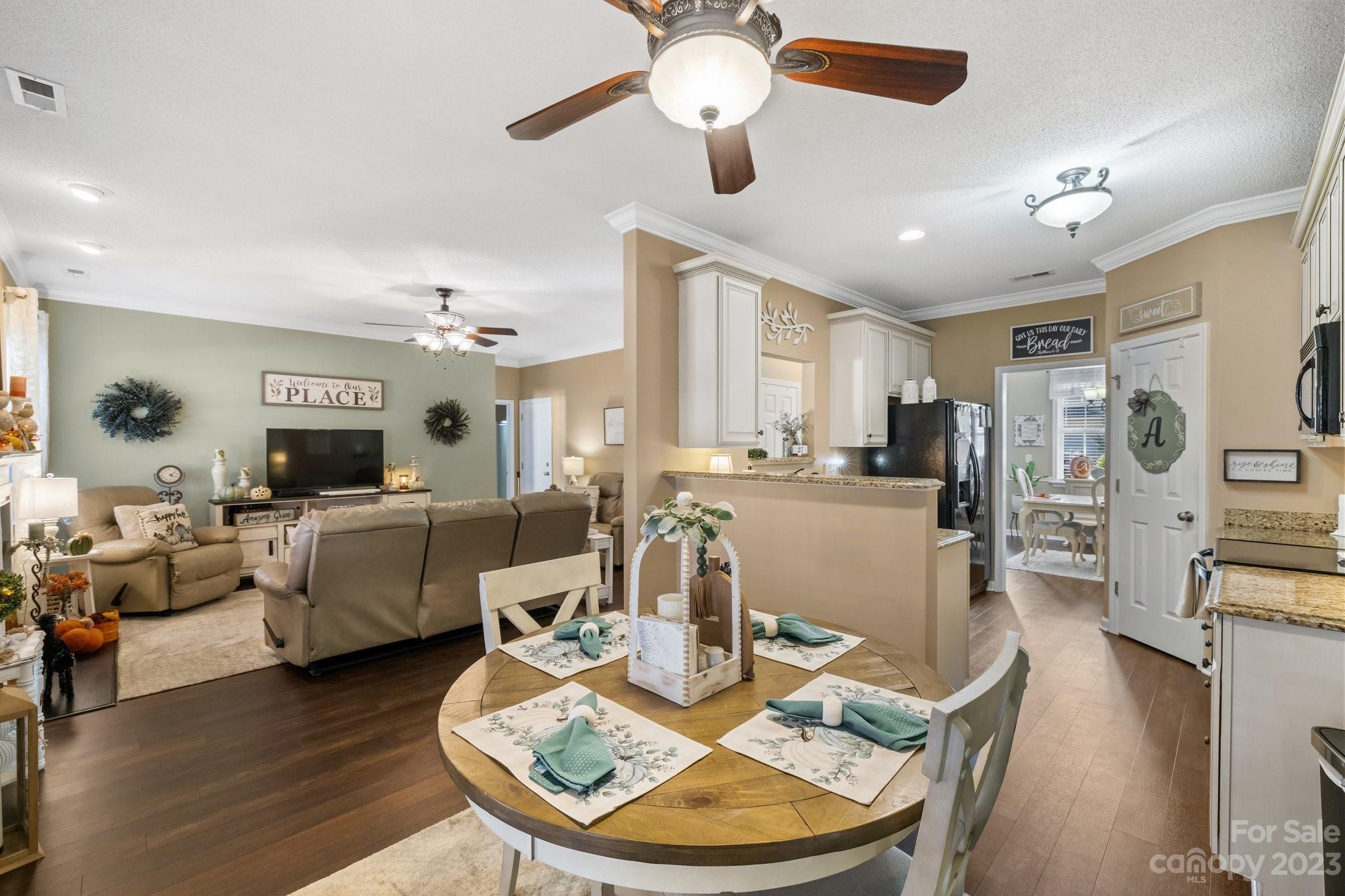 101 Woodfern Road Fletcher, NC 28732 - Photo 10 of 38 a living room with lots of furniture and kitchen view