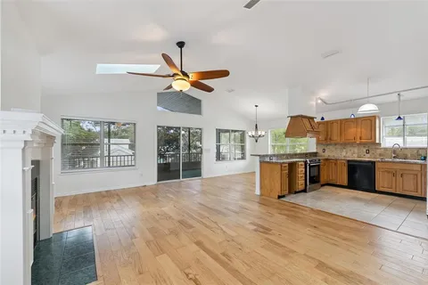 a view of kitchen with wooden floor