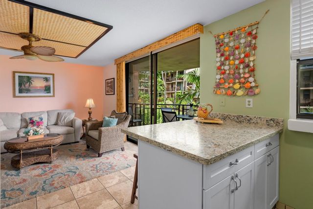 a living room with hard wood floor