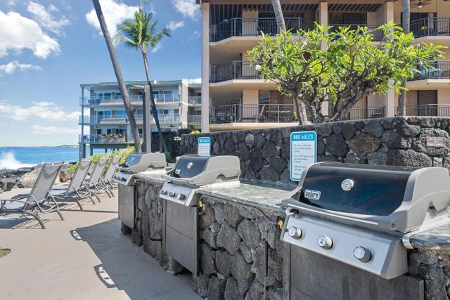 a terrace of a house with outdoor seating