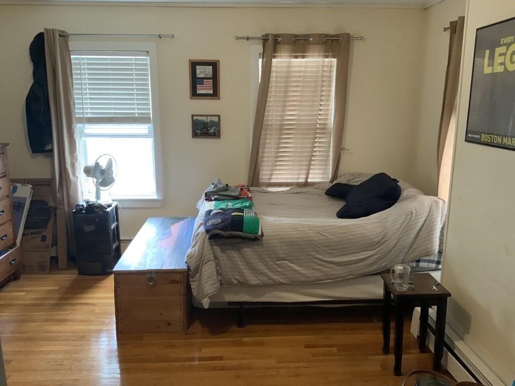 27 Jenkins Street Boston, MA 02127 - Photo 18 of 23 a living room with furniture and a window