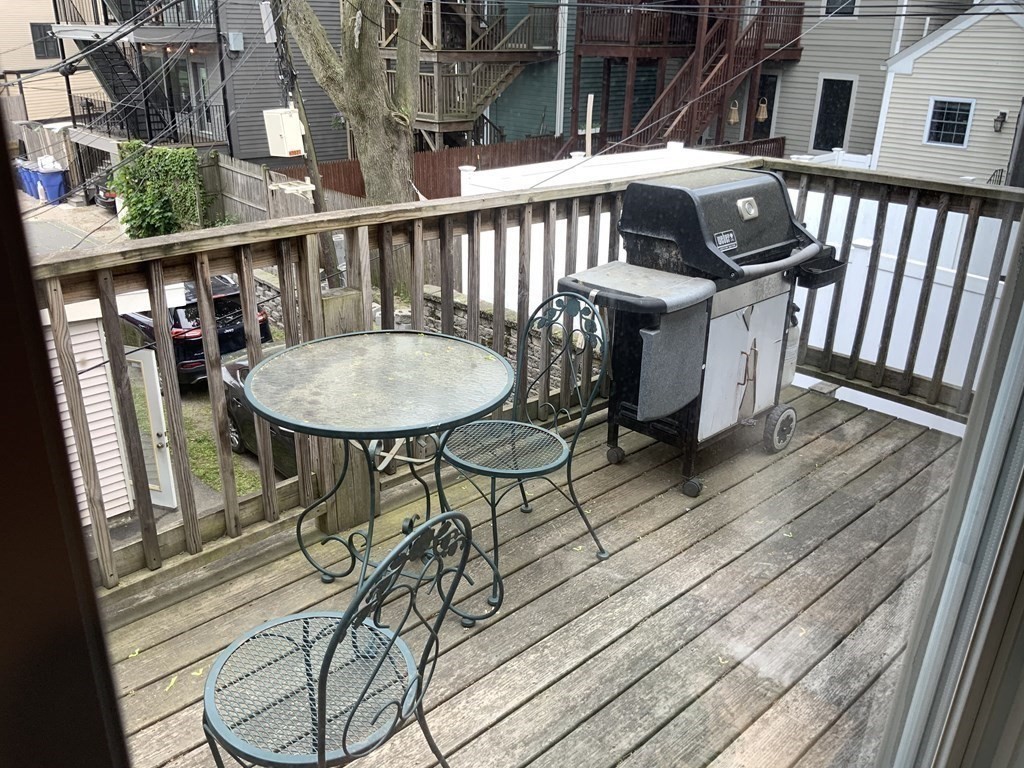 27 Jenkins Street Boston, MA 02127 - Photo 20 of 23 a view of a balcony with furniture