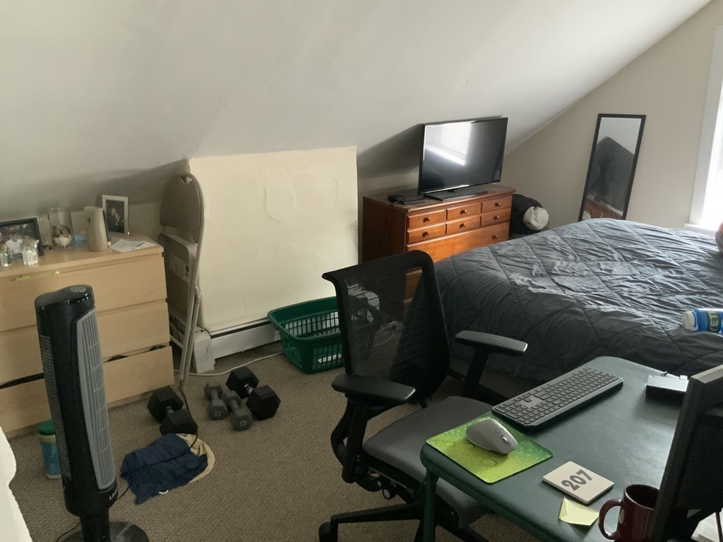 27 Jenkins Street Boston, MA 02127 - Photo 22 of 23 a bedroom with furniture and a lamp