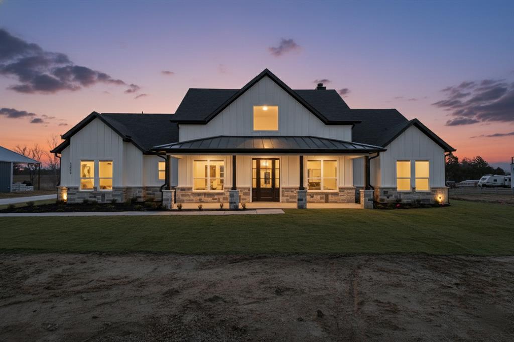 3089 County Road 1076 Celeste, TX 75423 - Photo 1 of 39 a front view of a house with a yard