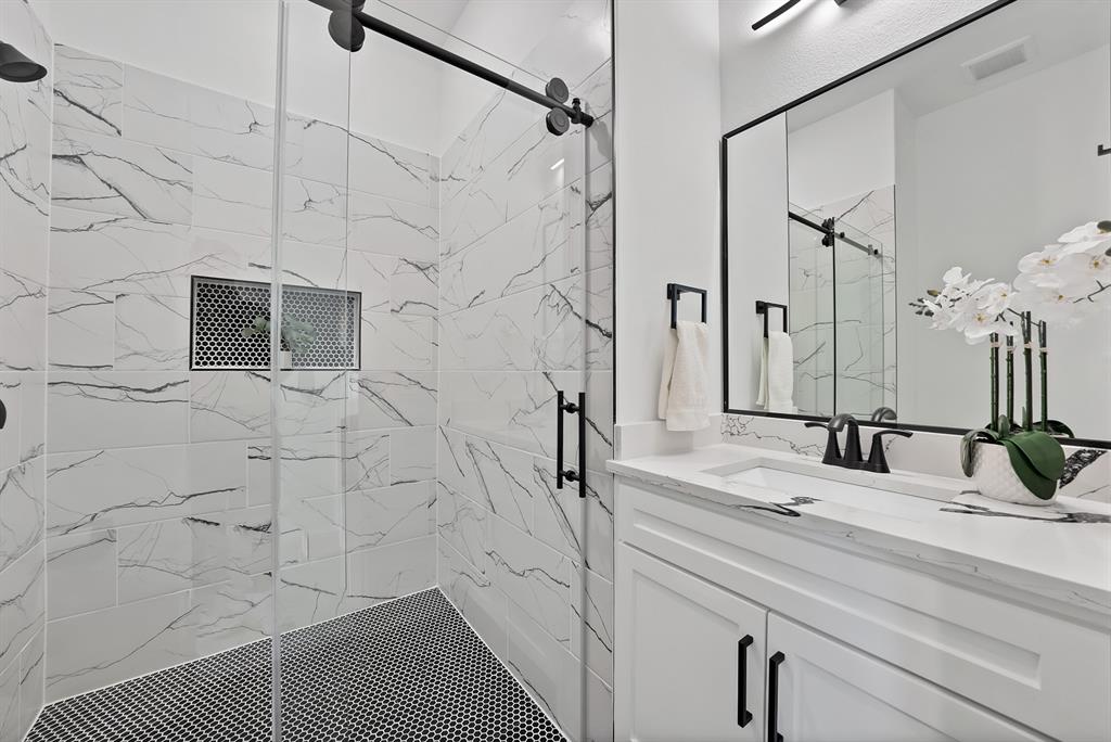 3089 County Road 1076 Celeste, TX 75423 - Photo 32 of 39 a bathroom with a sink and a mirror