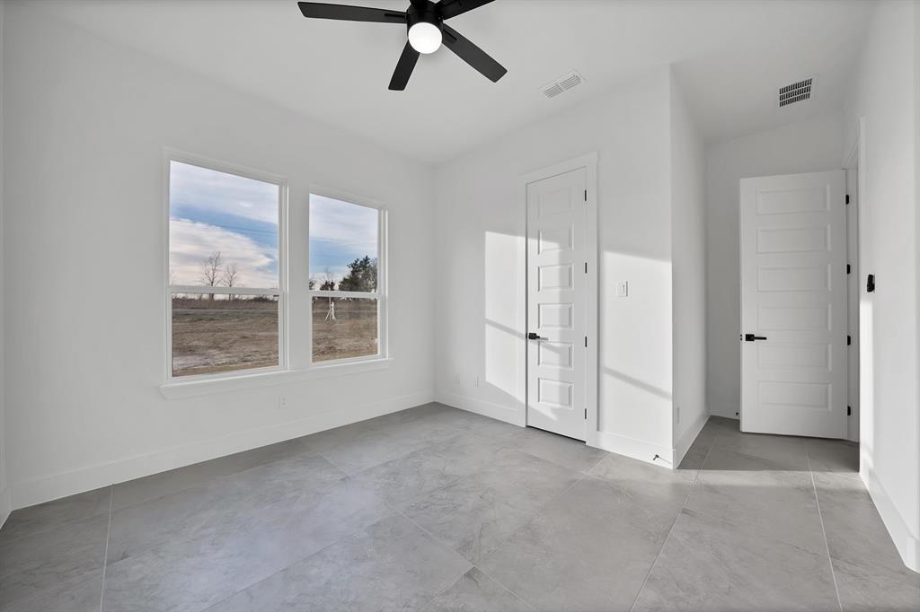3089 County Road 1076 Celeste, TX 75423 - Photo 34 of 39 a view of an empty room with a window